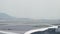 Passenger plane driving on runway for taking off in airport terminal Hong Kong city, China. Aircraft moving on runway