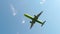 Passenger plane flies overhead