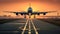 A passenger plane flying in the colorful sky. Aircraft takes off from the airport runway during the sunset.