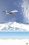 Passenger plane flying over mountains