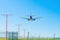 Passenger Plane Landing Seen from Behind