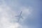 Passenger plane passing through the clouds