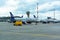 A passenger plane is standing at the airport in a parking space awaiting departure, the process of preparing for the flight is in