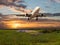 Passenger plane takes off from the airport runway.