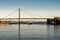 A passenger regular ferry from Stavanger to Tau passes under a city bridge in Stavanger, Norway