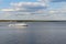 Passenger ship floats on the river