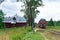 Passenger single-section mainline diesel locomotive TEP70-0084 with a suburban train Kuvshinovo-Ostashkov approaching the station