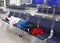 Passenger sleeps in an empty night airport after flight cancellation