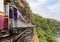 Passenger thai train moving on death of railway world war II at tham krasae railway station river kwai