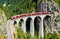 Passenger train crossing the Landwasser Viaduct in Switzerland