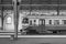 Passenger train at Lemberg-Holovnyi station, the main train station in Lviv, Ukraine, black and white