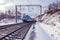 Passenger train moves along Baikal lake. Trans Siberian railway.