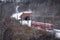 Passenger train moving towards the tunnel