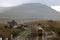 Passenger train passing Blea Moor, Ingleborough