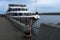 Passenger transport river ship moored at the pier.