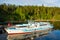 Passenger vessel is off the coast of the island of Valaam in the