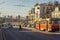 passenger walking out from tram stopped in the middle of sunny morning street of Tula, Russia