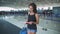 Passenger, woman in the airport, waiting for her flight checking her passport and documents