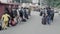 Passengers arriving at railway station in Corona pandemic situation, waiting for there registration in line in india.