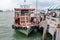 Passengers board the cruise ship at port.