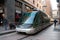 Passengers board an electric tram on a narrow city street