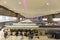 Passengers checking luggage at the ticketing counters of Don Mueang International Airport in Bangkok.