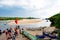 Passengers of Cruise Liner waiting for Zodiac Boat to go back to Ship, Kodi, Sumba Island, Nusa Tenggara