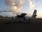 Passengers disembarking from a twin otter in the grenadines