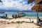 Passengers are embarked in a boat that is moored on the beach. Gili Island. Indonesia