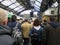 Passengers exiting trains on to a Brighton train station platform