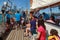 Passengers on a historic sailboat in Auckland Harbour, New Zealand