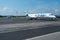 Passengers jet of Adria Airways on apron in Ljubljana Airport