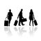 Passengers with luggage and trolley