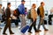 Passengers queued in line for boarding at departure gate