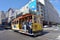 Passengers riding on cable car in San Francisco, CA