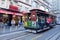 Passengers riding on Powell-Hyde line cable car in San Francisco