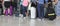 Passengers in row waiting check-in counters at airport at Paris, France