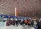 passengers stand in queues to check in counters at Beijing airport