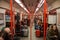 Passengers in subway train interior