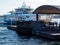 Passengers and vehicles boarding Ninoshima ferry boat at Ujina passenger terminal of Hiroshima