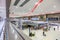 Passengers wait in line to check in their flight at Don Muang International Airport check in counters in Bangkok, Thailand