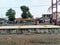 The passengers are waiting the arrival of commuter train in Tambun, West Java, Indonesia