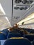 Passengers waiting inside a delayed airplane