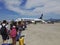 Passengers walking on tarmac of Milan Bergamo Airport, Italy.