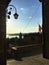 Passignano sul Trasimeno ancient town, Umbria region, Italy. Lake, lamp, blue sky and peace
