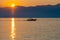Passing boat in the sunrise of Lefkada, Greece