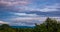 Passing cloud of colorful sky in the morning over mountain and tree