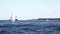 Passing the Portland bug light lighthouse on a boat in the water