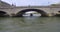 Passing under the Pont au Change in Paris