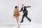 Passion. Elegant couple of dancers in vintage evening dress and suit dancing retro ballroom dance. Love and music